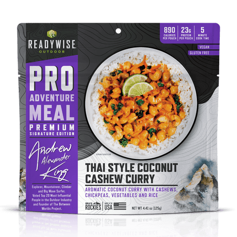 Thai Style Coconut Cashew Curry. Aromatic coconut curry with cashews, chickpeas, vegetables, and rice. 890 calories, 23g protein. Vegan, Gluten-Free. Created with Andrew Alexander King.