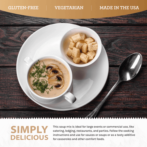 Cream of mushroom soup with fresh herbs and croutons in white bowls on a wooden table