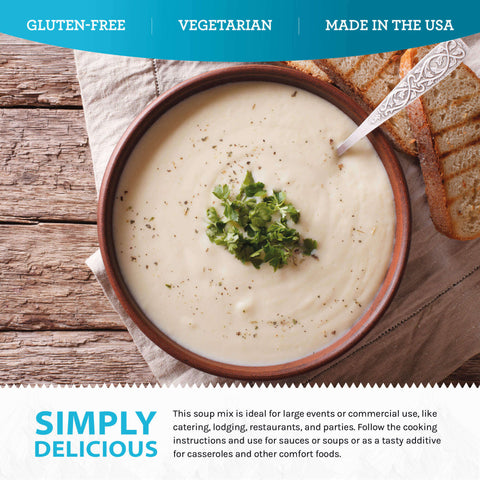 Creamy gluten-free vegetarian soup in a bowl with herbs and grilled bread on rustic table.